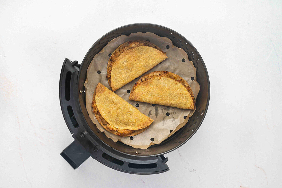 Three chicken tacos in the air fryer