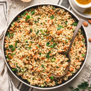 Overhead view of a bowl of curried couscous salad