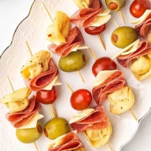 Mini Tortellini Kabobs with salami, cherry tomatoes, and cheese on party skewers