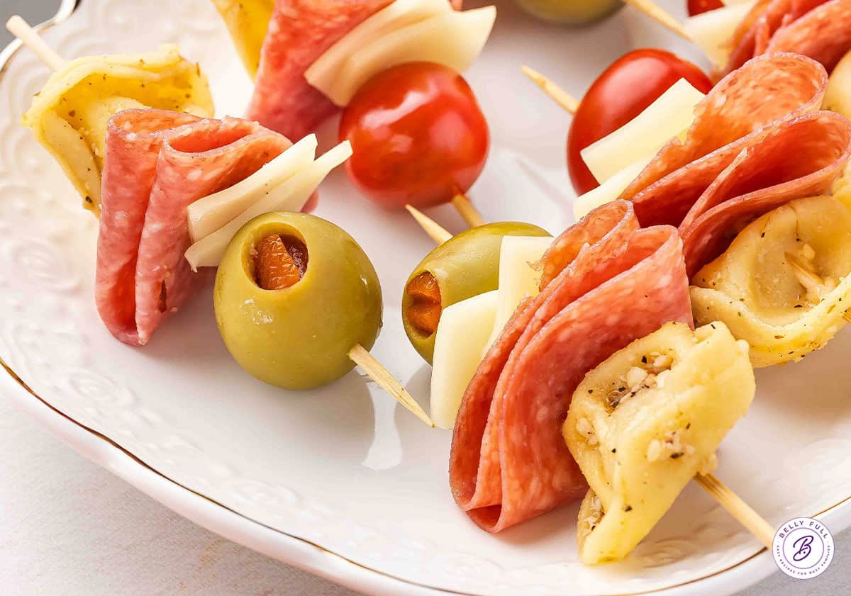 Mini Tortellini Kabobs with salami, olives, and cheese on party skewers