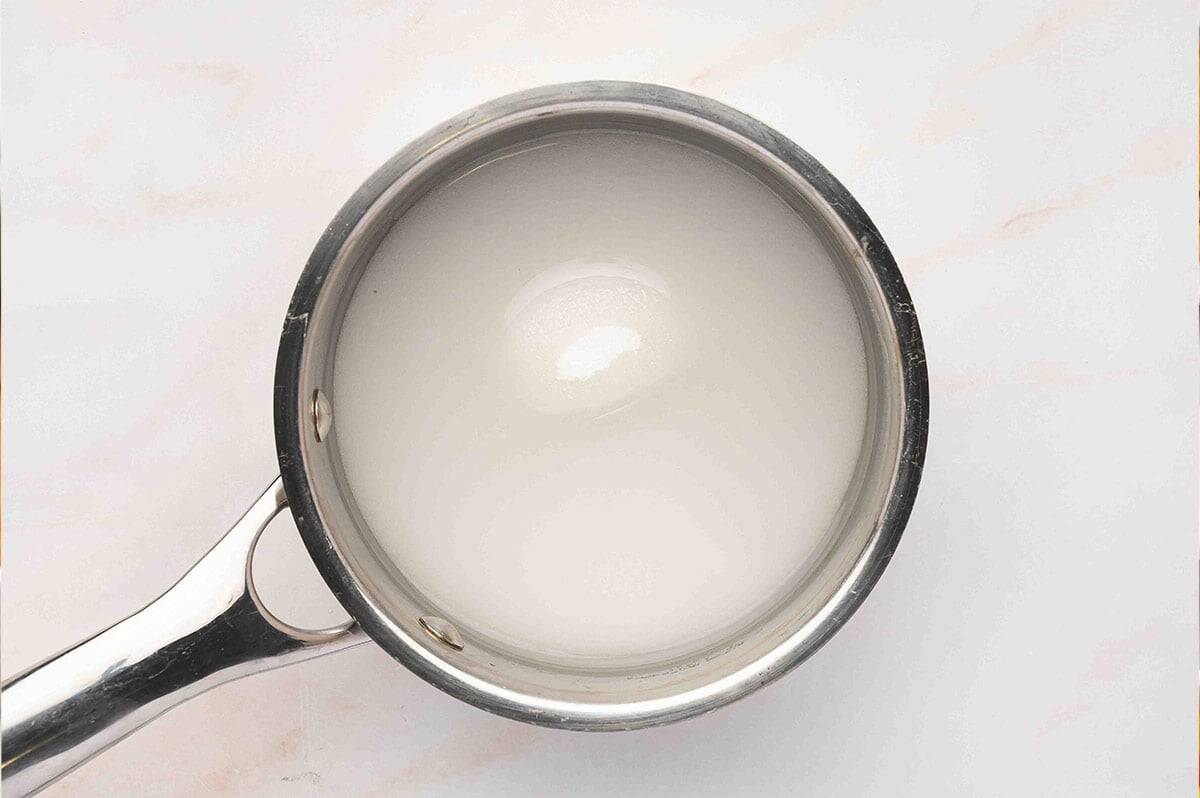 Sugar and water in a saucepan