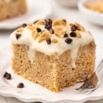 A slice of cannoli cake on a plate