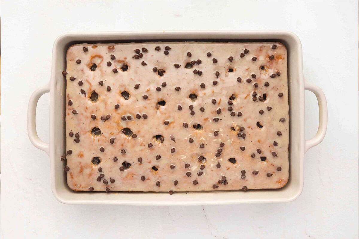 Chocolate chips on top of a poke cake