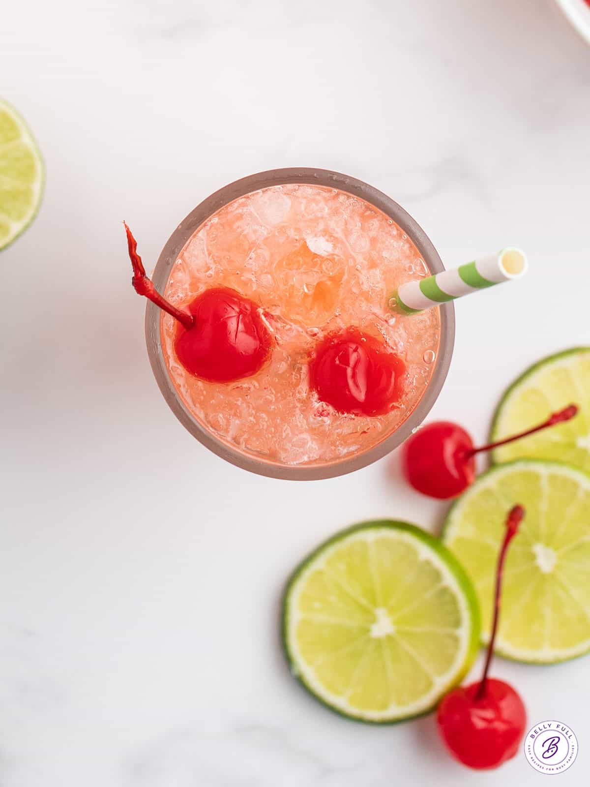 overhead cherry limeade in glass with straw