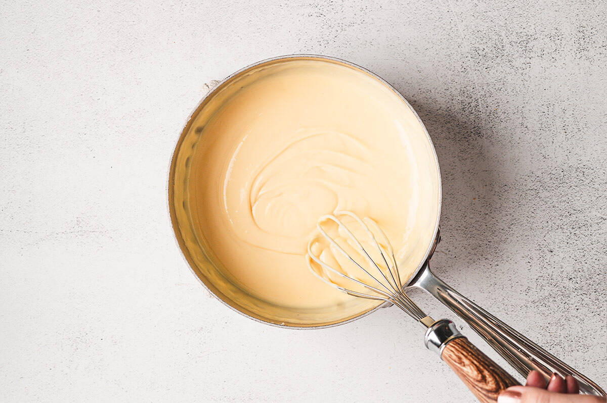 Smooth, golden cheese sauce ready to serve.
