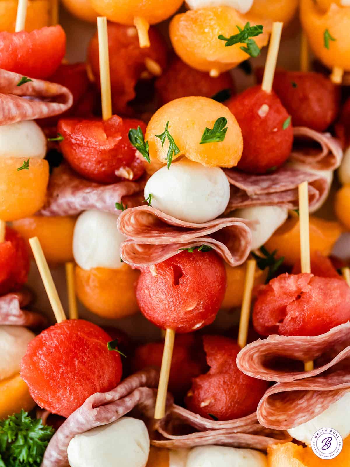 melon balls, salami, mozzarella kabobs
