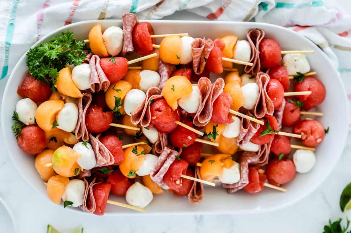 overhead platter of mini fruit kabobs