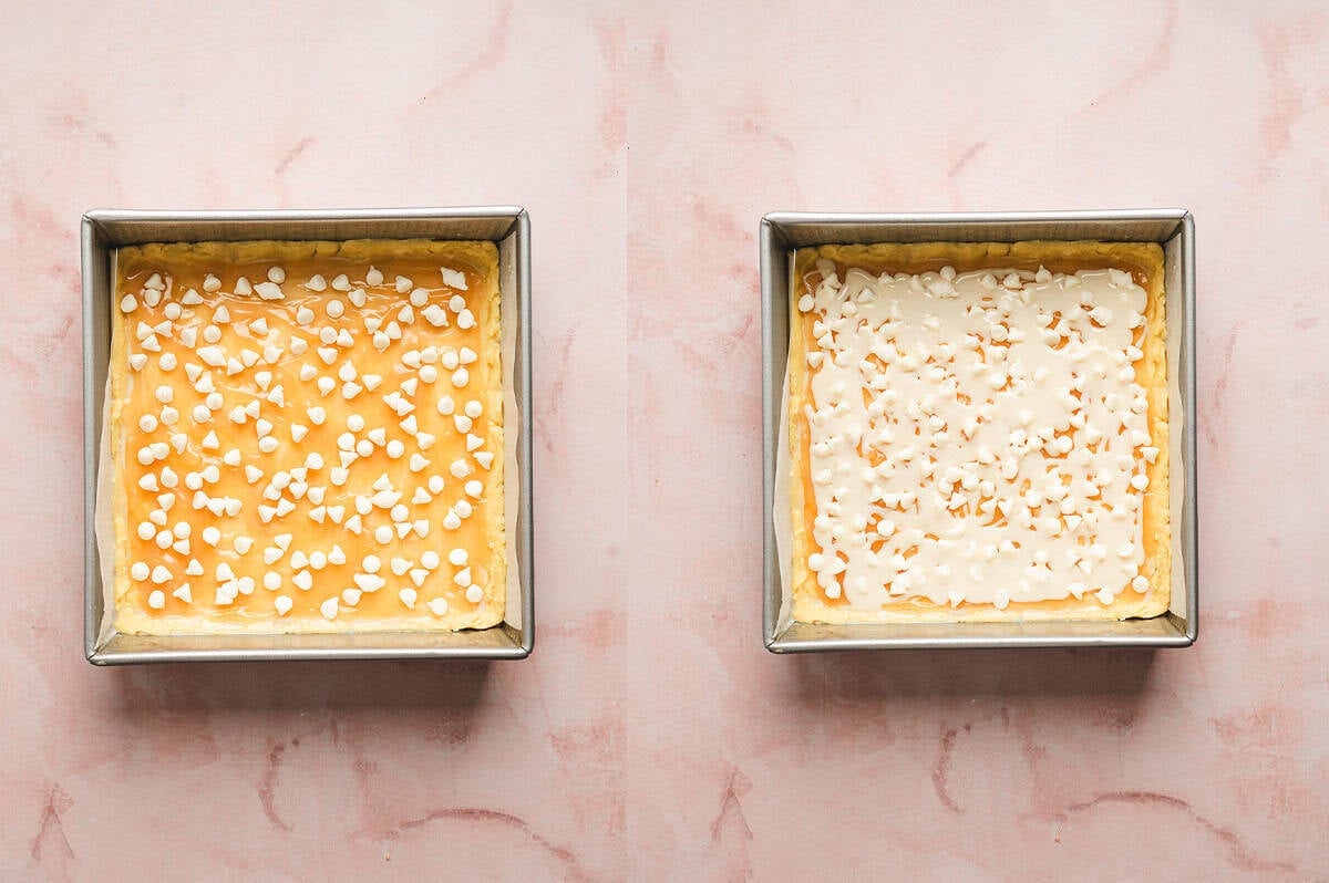 layers of condensed milk, white chocolate chips, lemon curd, and dough in square baking dish