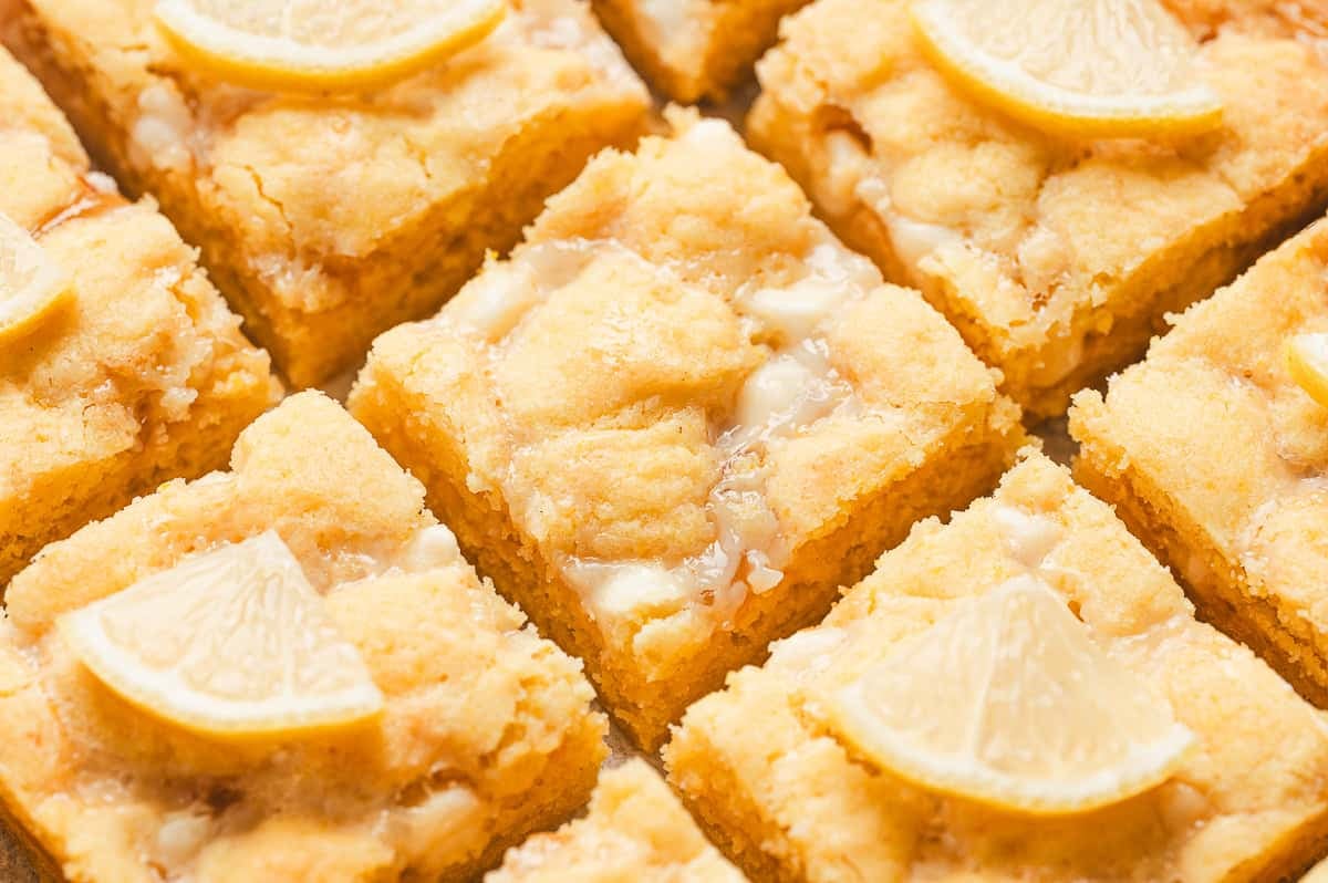close up lemon gooey bar with melted white chocolate