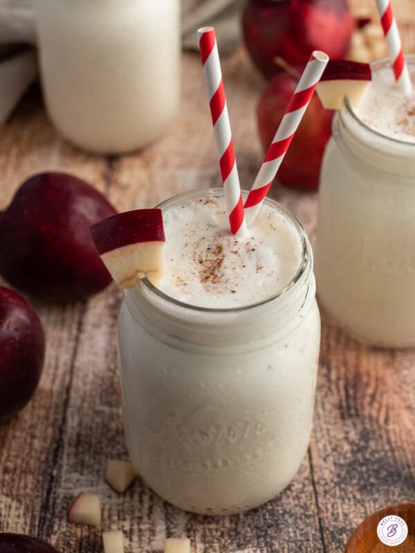 Apple Pie Smoothie in mason jar with straws