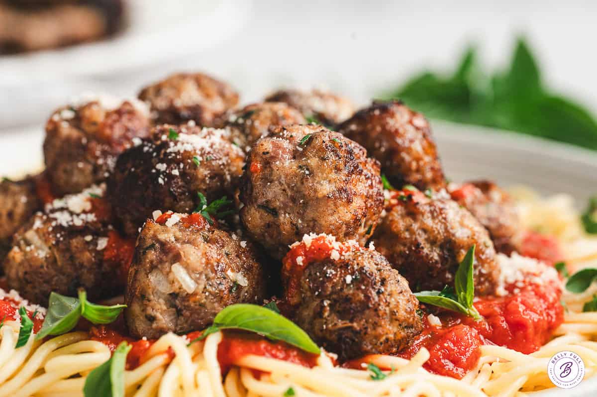 homemade Italian Meatballs on top of spaghetti