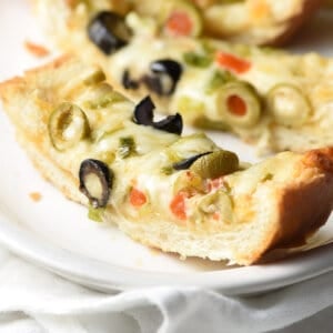 slice of Olive Cheese Bread on plate