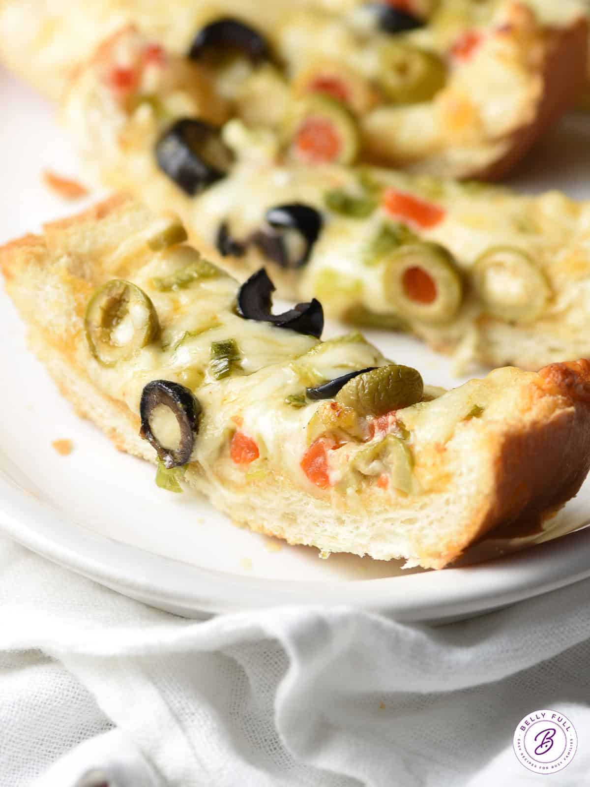 slice of Olive Cheese Bread on plate