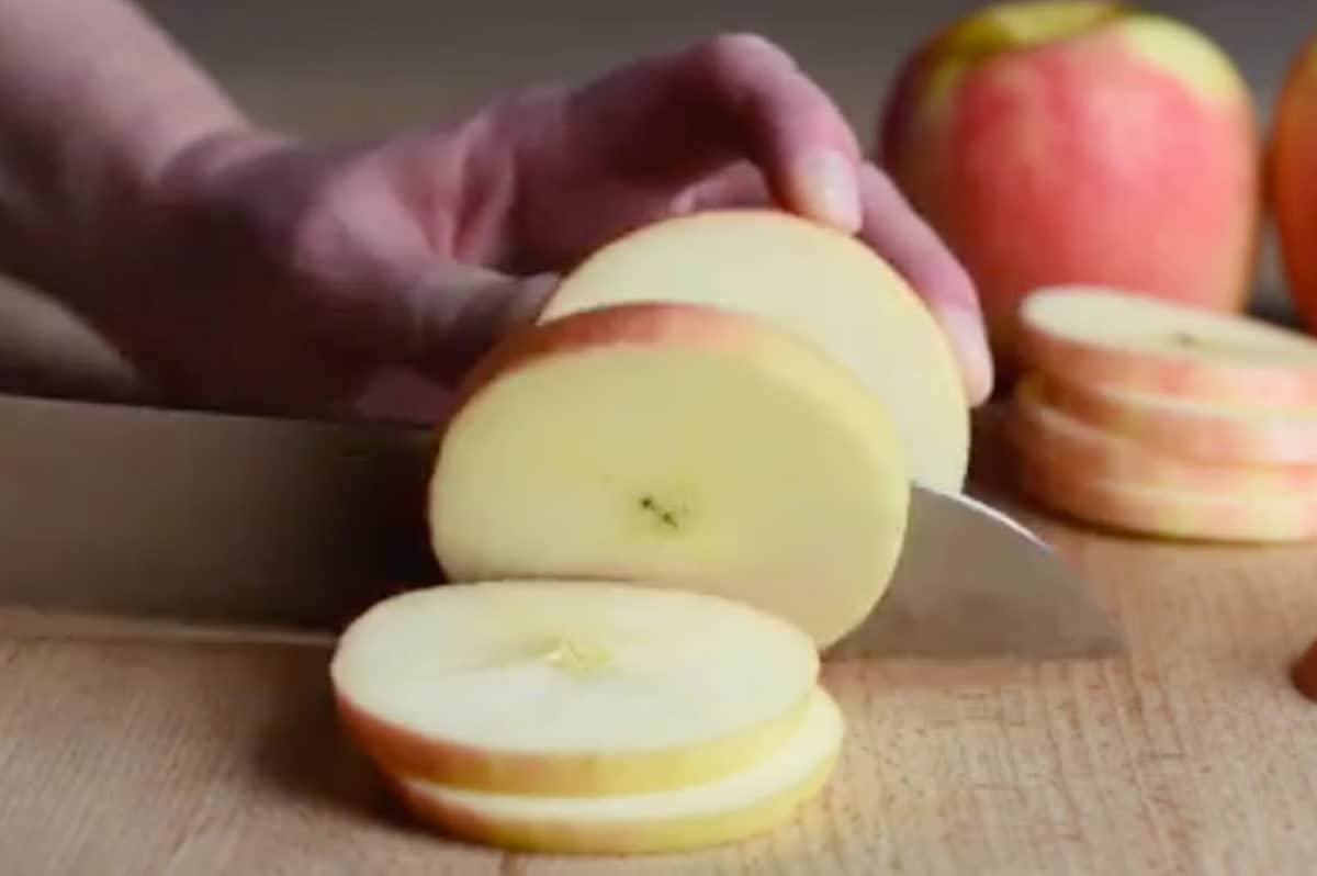 Apple being sliced