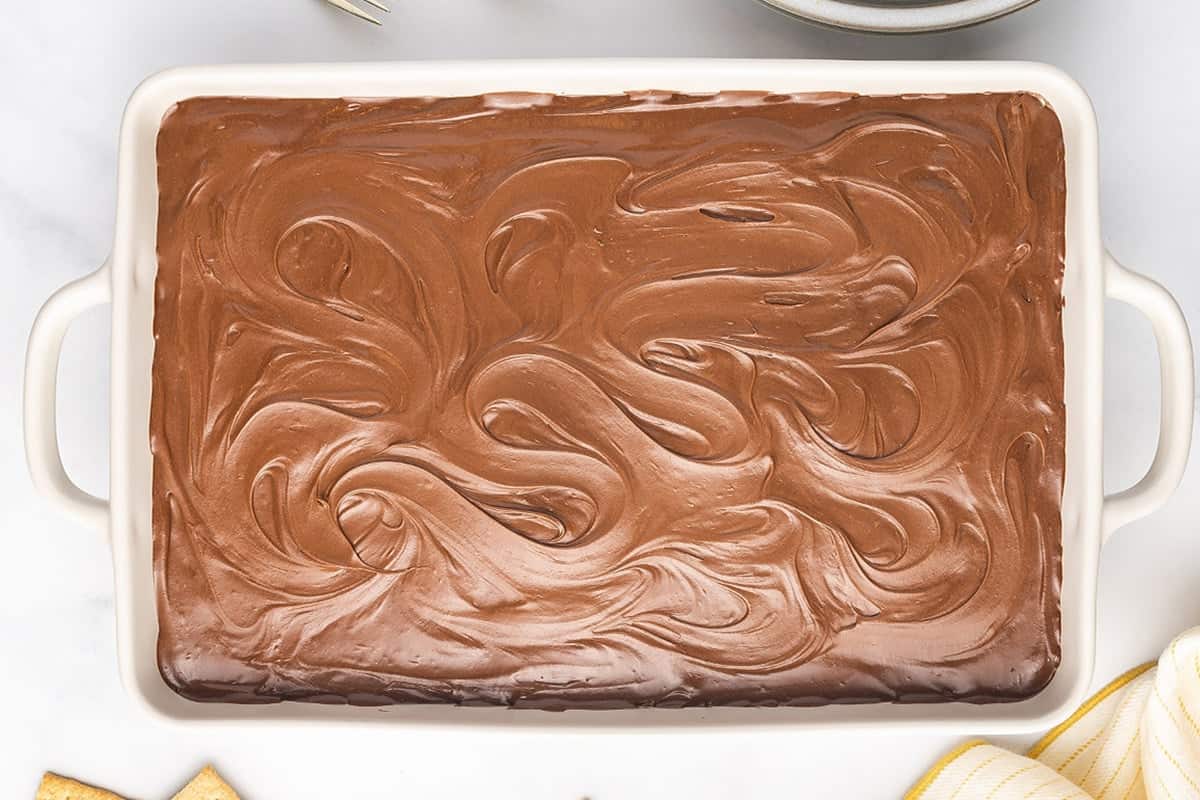 chocolate frosted cake in 9x13 casserole dish