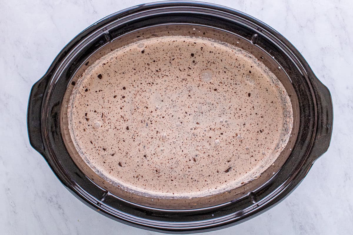 heavy cream and cocoa powdered mixed together in crockpot