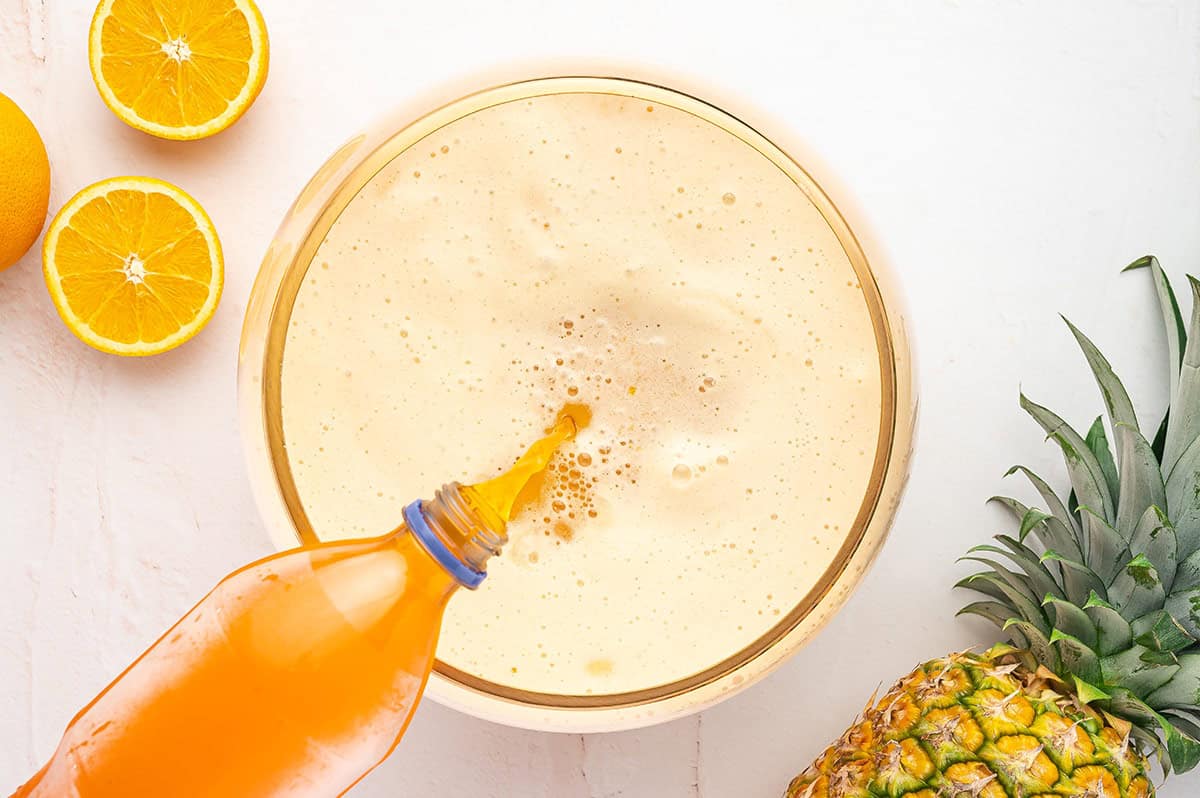 orange soda poured into Halloween punch