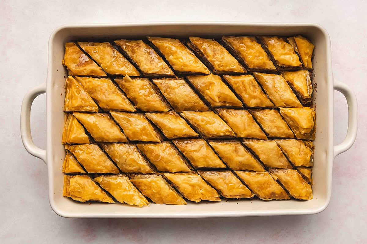 overhead Baklava cut into triangles in baking dish