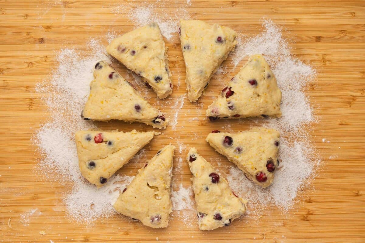 unbaked cranberry orange scones cut into 8 wedges