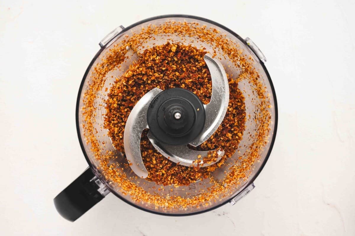 Chopped smokehouse almonds and sun-dried tomatoes pulsed into fine crumbs in a food processor.