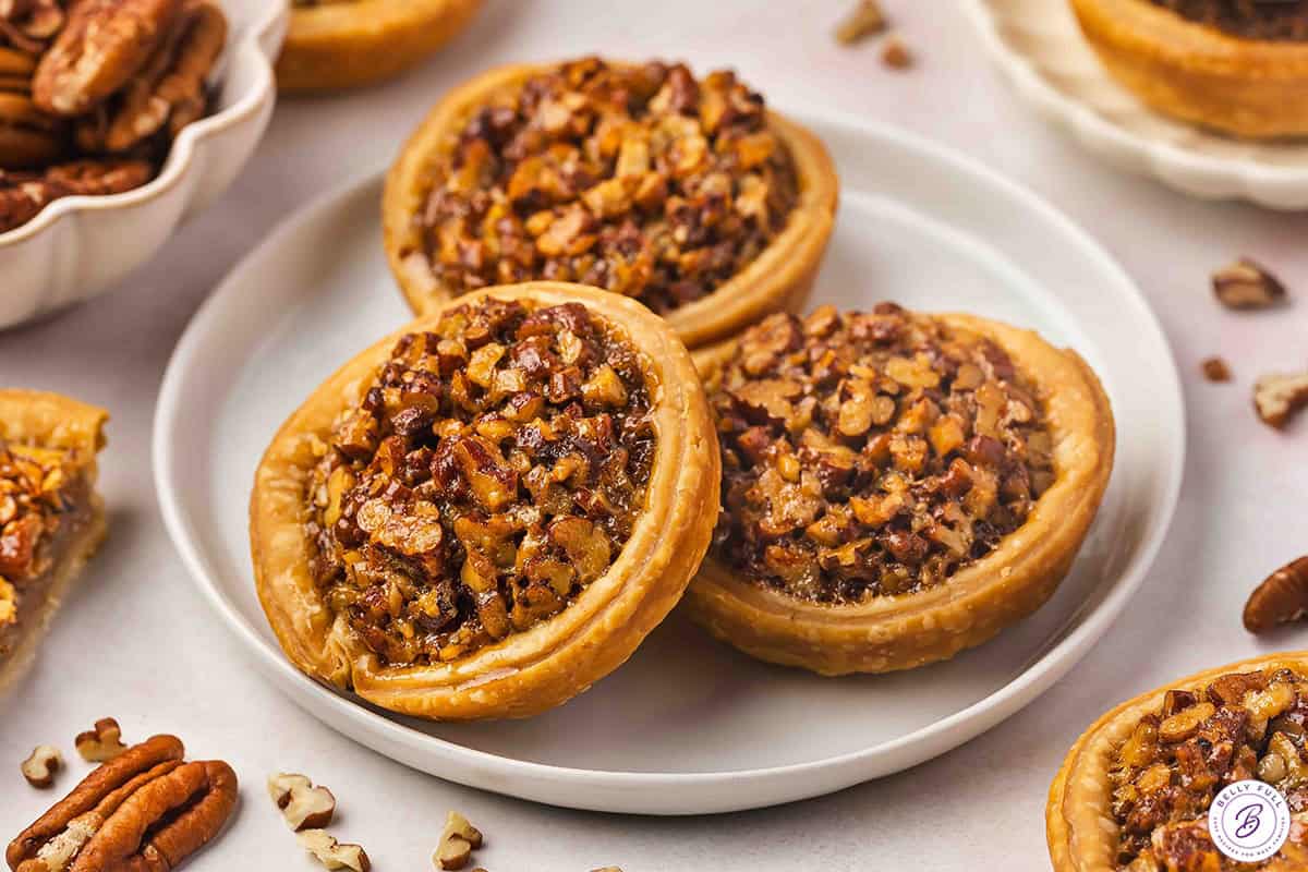 3 mini pecan pies on plate