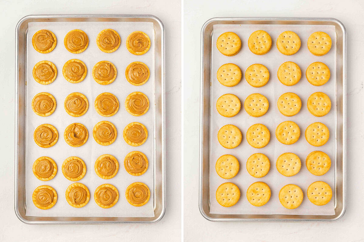 Tray of Ritz crackers spread with peanut butter next to a tray of plain Ritz crackers ready to be sandwiched together.