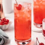Shirley Temple drink with maraschino cherry