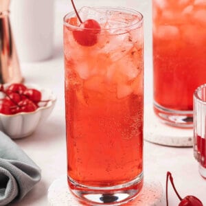 Shirley Temple drink with maraschino cherry