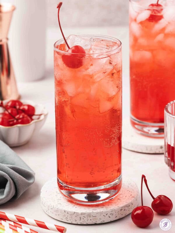 Shirley Temple drink with maraschino cherry