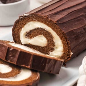Chocolate Swiss Roll with end cut on serving tray