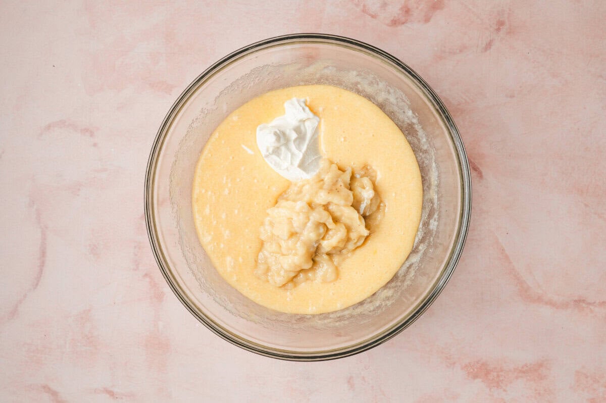 sour cream and mashed banana added to beaten eggs and sugar