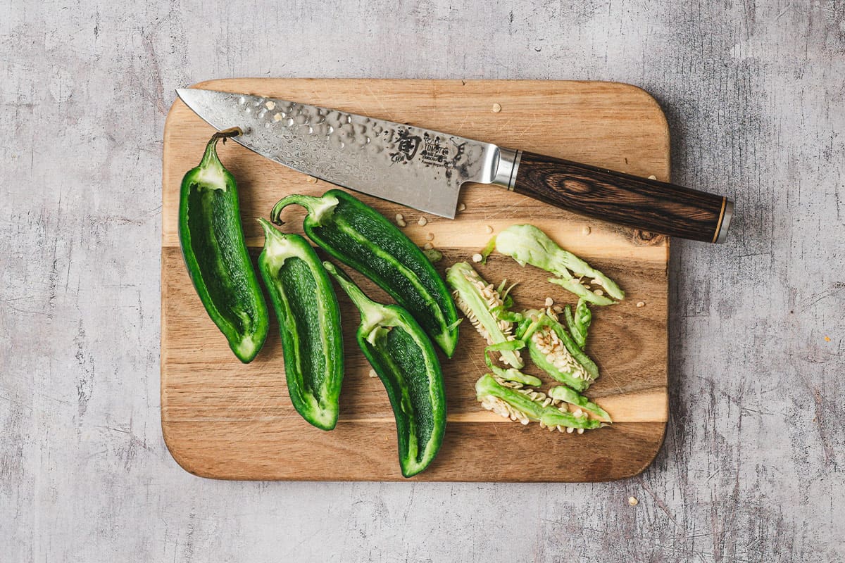 jalapeno peppers sliced in half with seeds removed