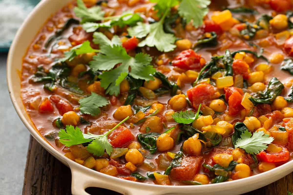 side angle of chickpea curry in skillet