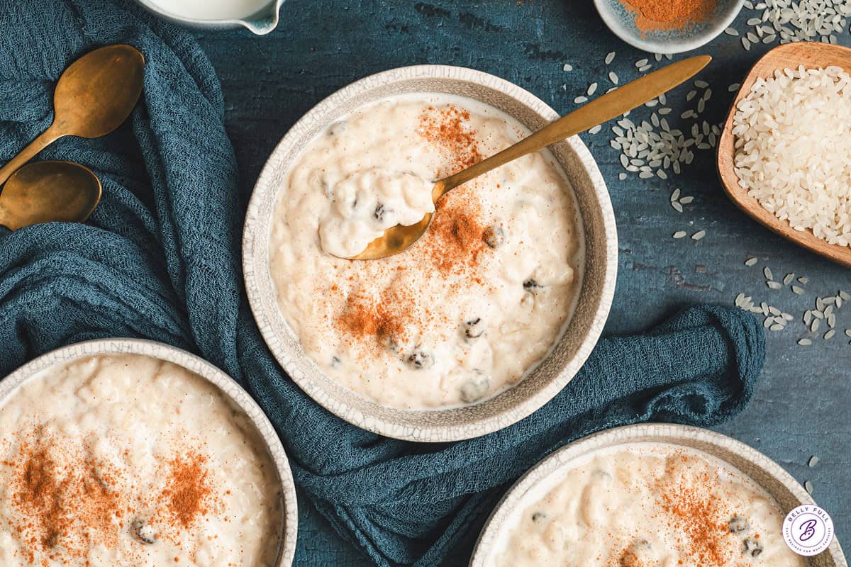 overhead photo of rice pudding in bowl with spoon