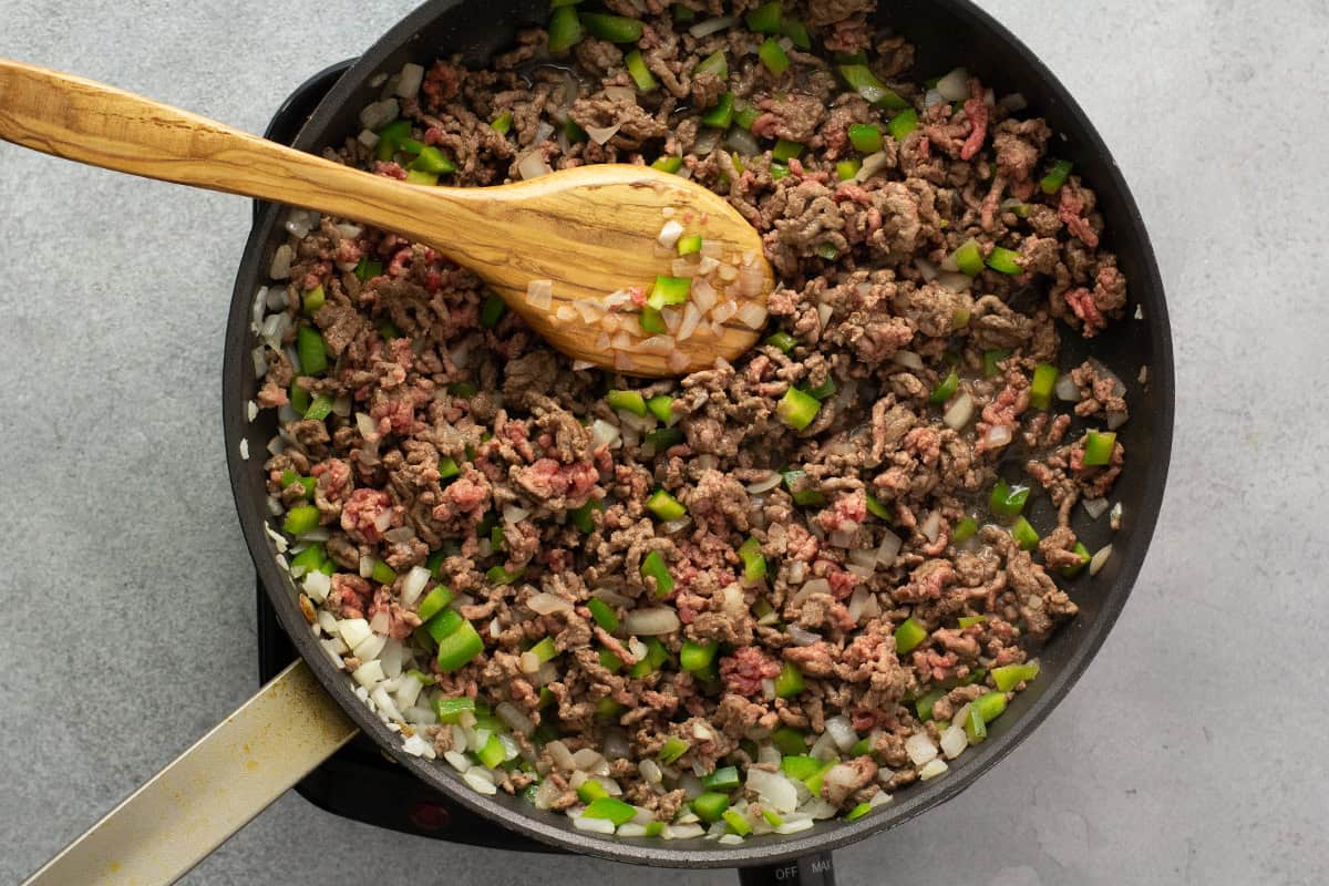 ground beef and diced veggies in skillet