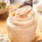 spoonful of homemade Thousand Island Dressing over jar