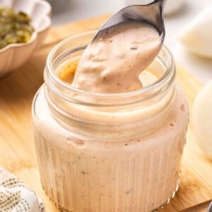 spoonful of homemade Thousand Island Dressing over jar