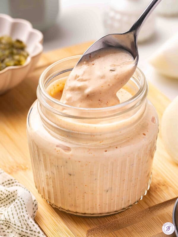spoonful of homemade Thousand Island Dressing over jar