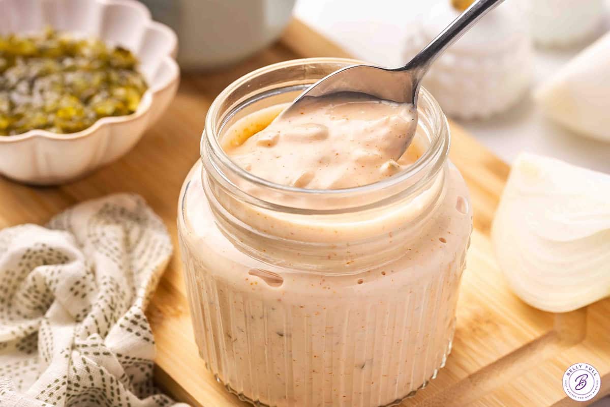 spoonful of homemade Thousand Island Dressing over jar