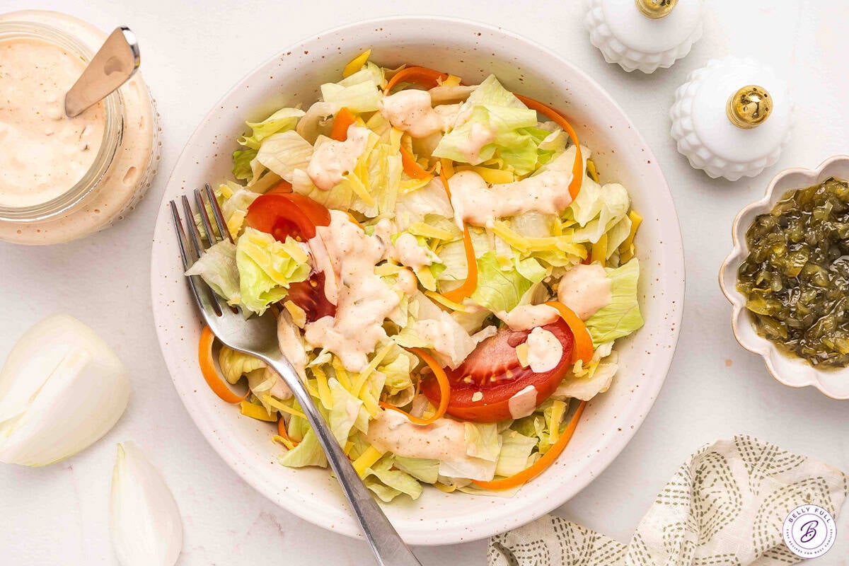 drizzle of Homemade Thousand Island Dressing over salad