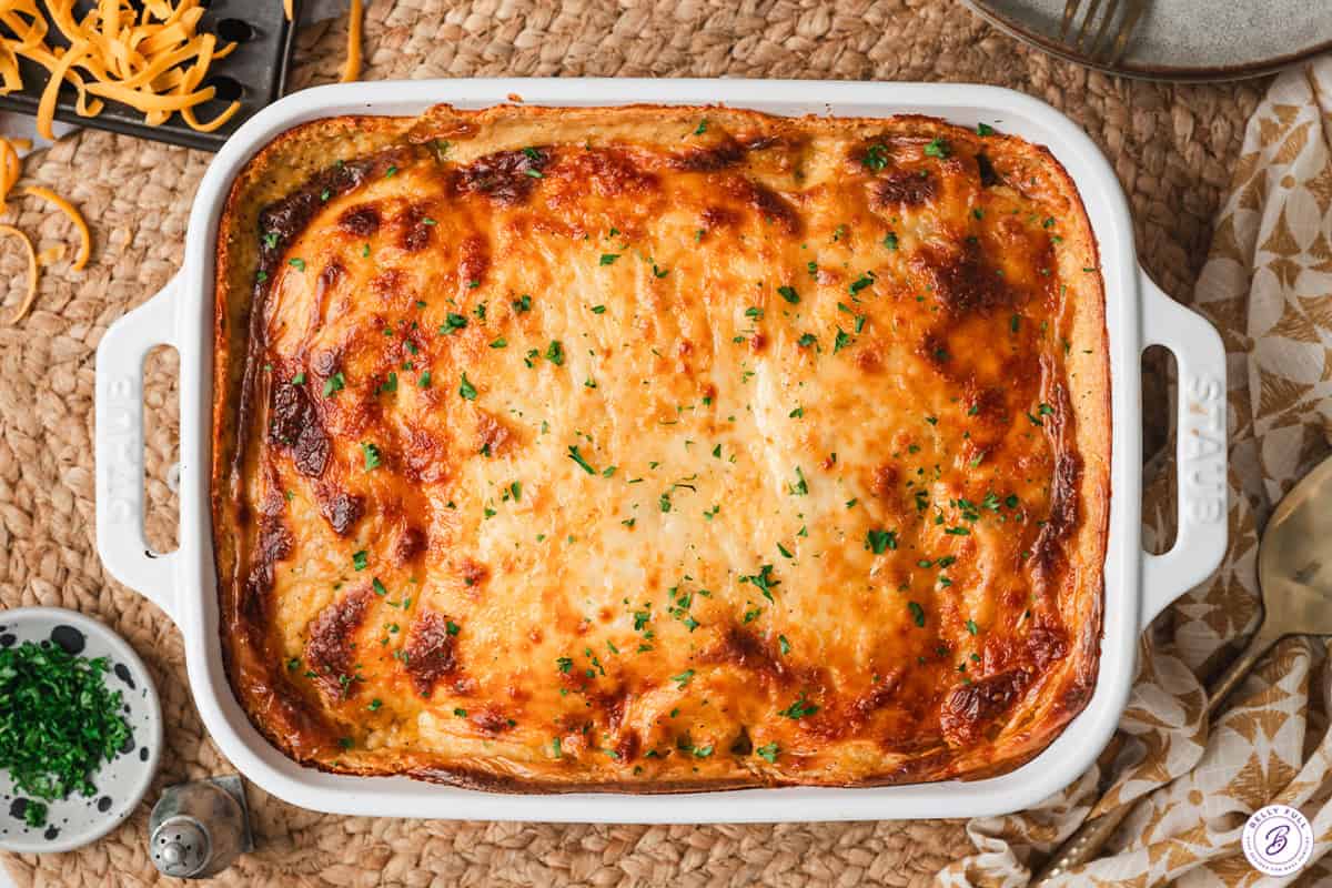 au gratin potato casserole freshly baked and sprinkled with parsley