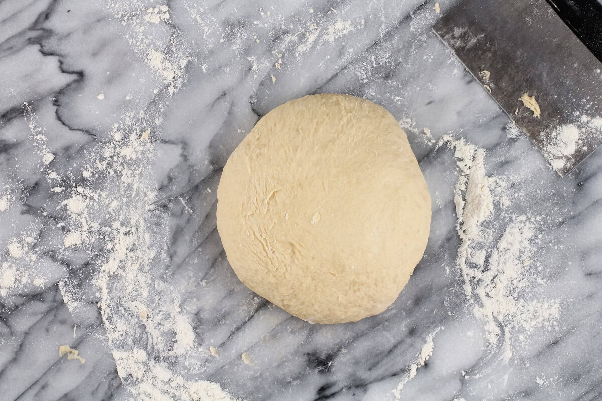 formed dough ball on work surface