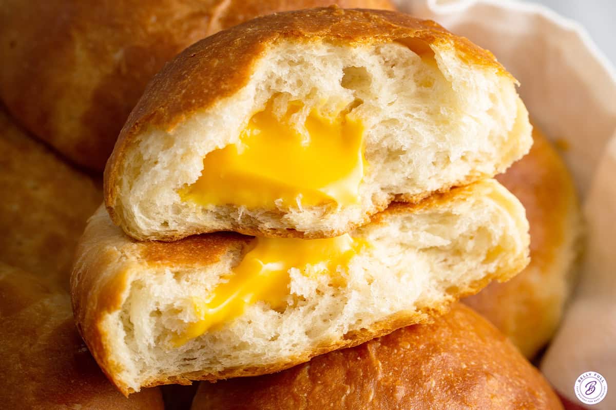 close up cheese zombies split in half with gooey cheese