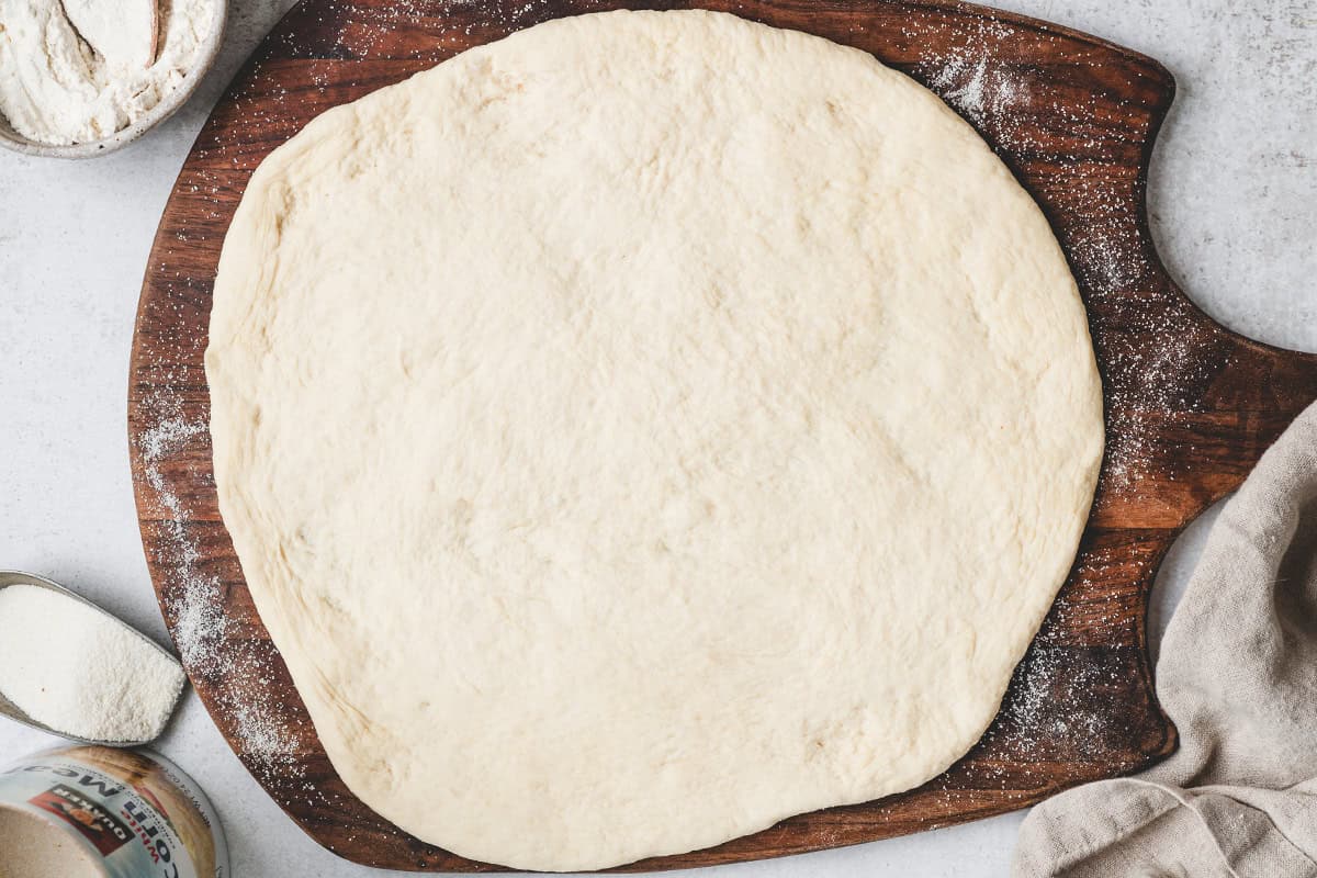 unbaked large pizza crust