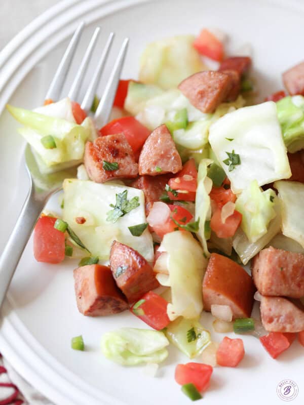 Mexican Kielbasa and Cabbage on plate with fork