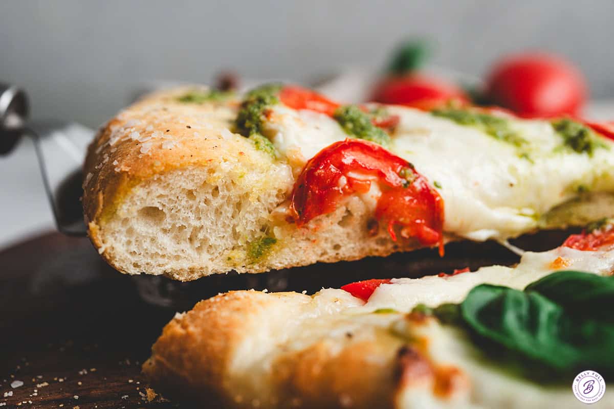 side view of crispy baked pizza crust