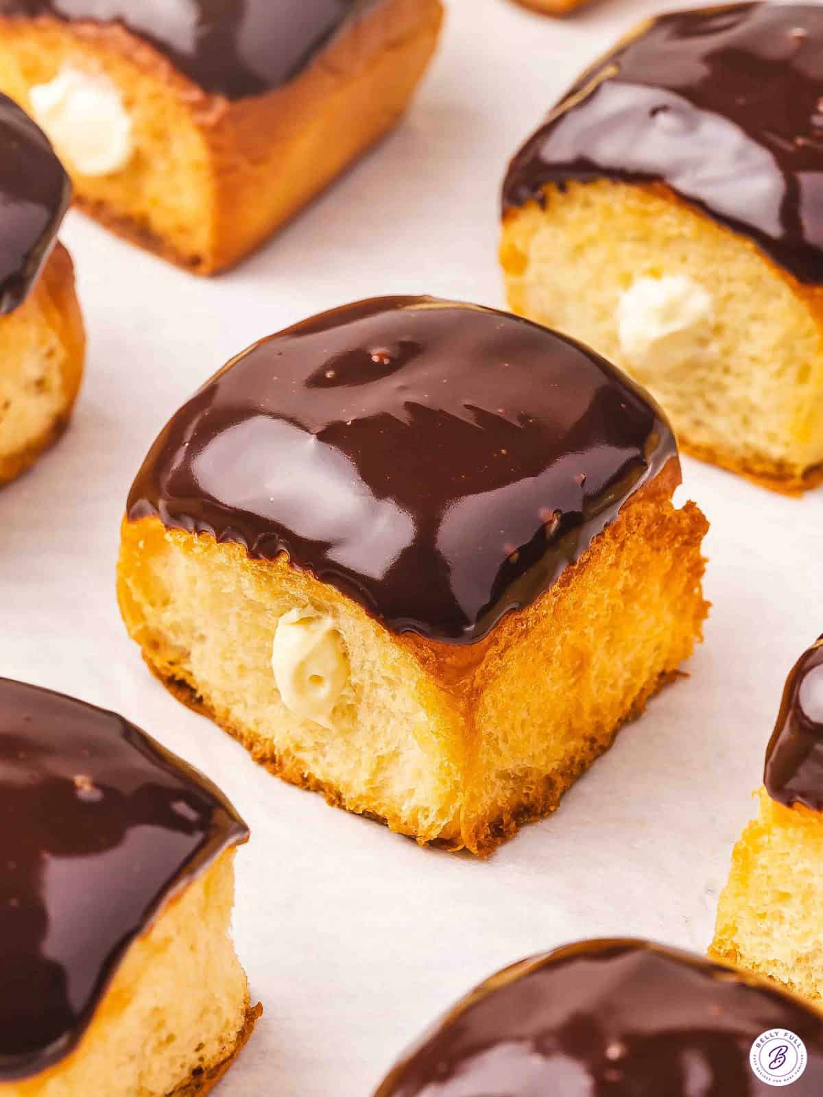 Side view of Boston Cream Pie Roll “Donuts”.