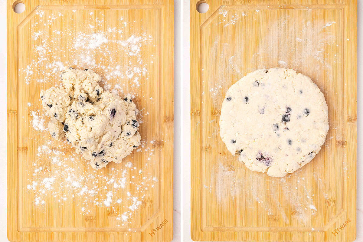 Lemon blueberry scone dough turned onto a floured cutting board and gently pressed into a round disk.