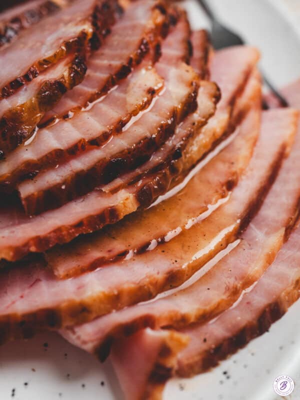 A baked ham covered in pineapple ham glaze.