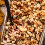 Overhead view of a finished reuben bake casserole with a spoon.
